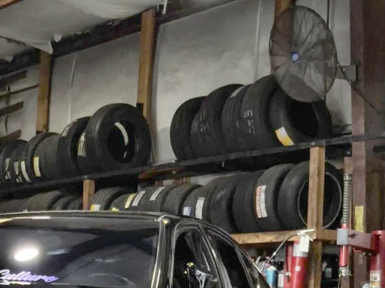 Racks of tires inside the H&R shop